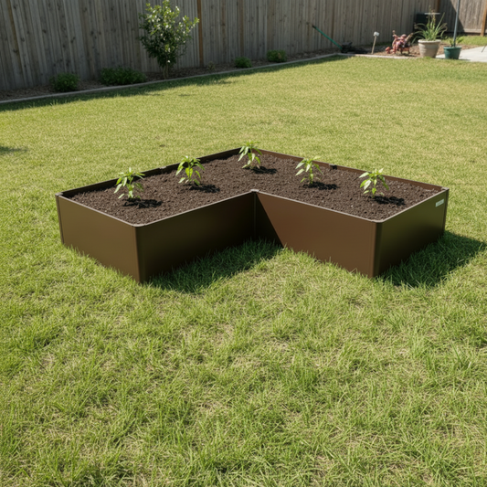 Umber Brown tall L-shaped modern raised garden bed in a backyard with five pepper plants growing.