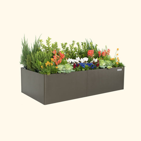 Urban Charcoal tall 42 inch by 83 inch modern raised garden bed with colorful flowers and plants on a white background.