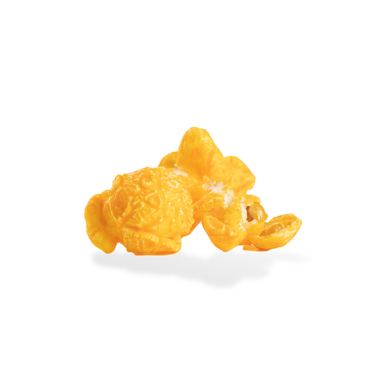 Three pieces of Bacon CHeddar popcorn on a white background