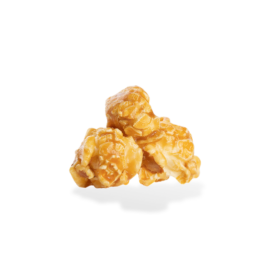 Three pieces of Caramel popcorn on a white background
