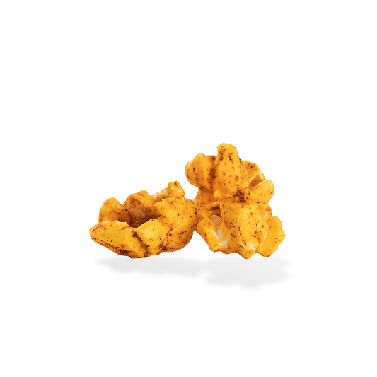 Three pieces of Chili Lime Cheese popcorn on a white background