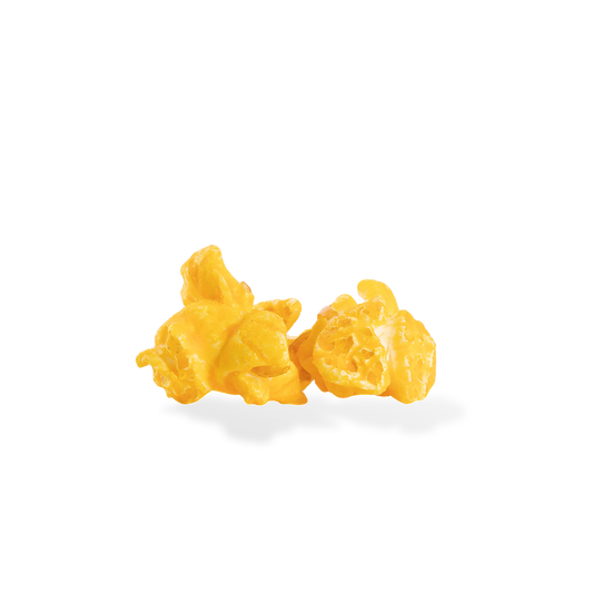 Three pieces of Mac and Cheese popcorn on a white background