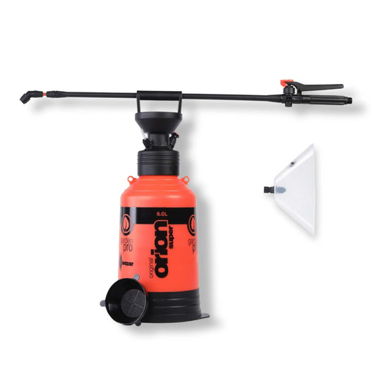 Orange pump sprayer with black nozzle and white funnel on a white background