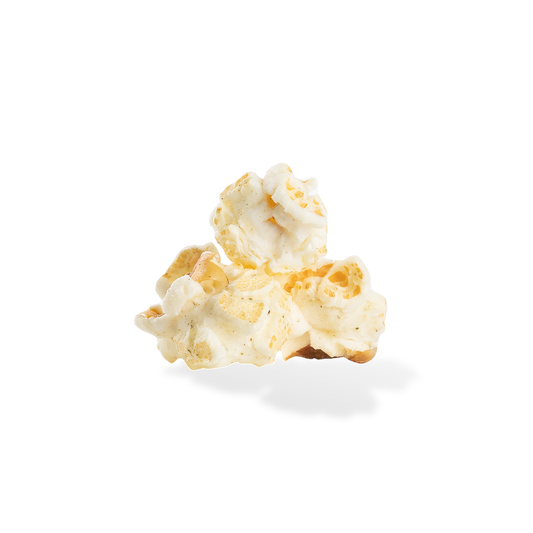 Three pieces of Rosemary Parmesan popcorn on a white background