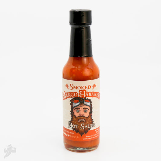 A bottle of Smoked Mango Habanero Hot Sauce over a white background