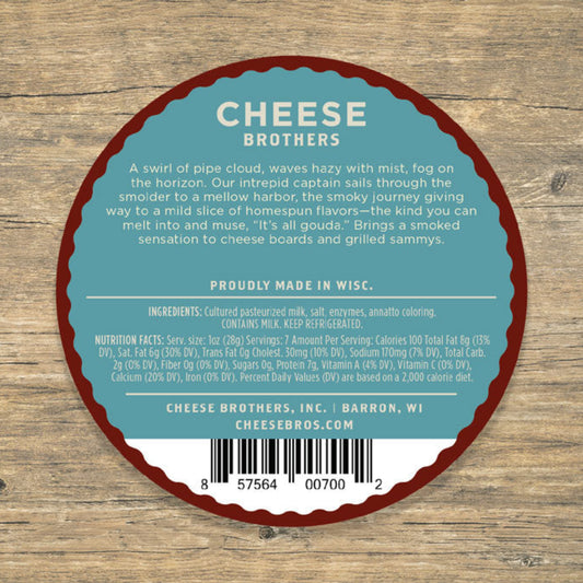 Smoked gouda cheese product label with ingredients and nutrition facts displayed over wood background