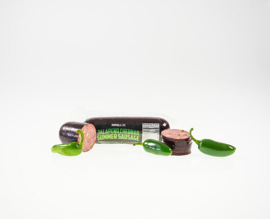 Pepper Joe's jalapeno sausage - spicy jalapeno sausage with jalapeno peppers on white background