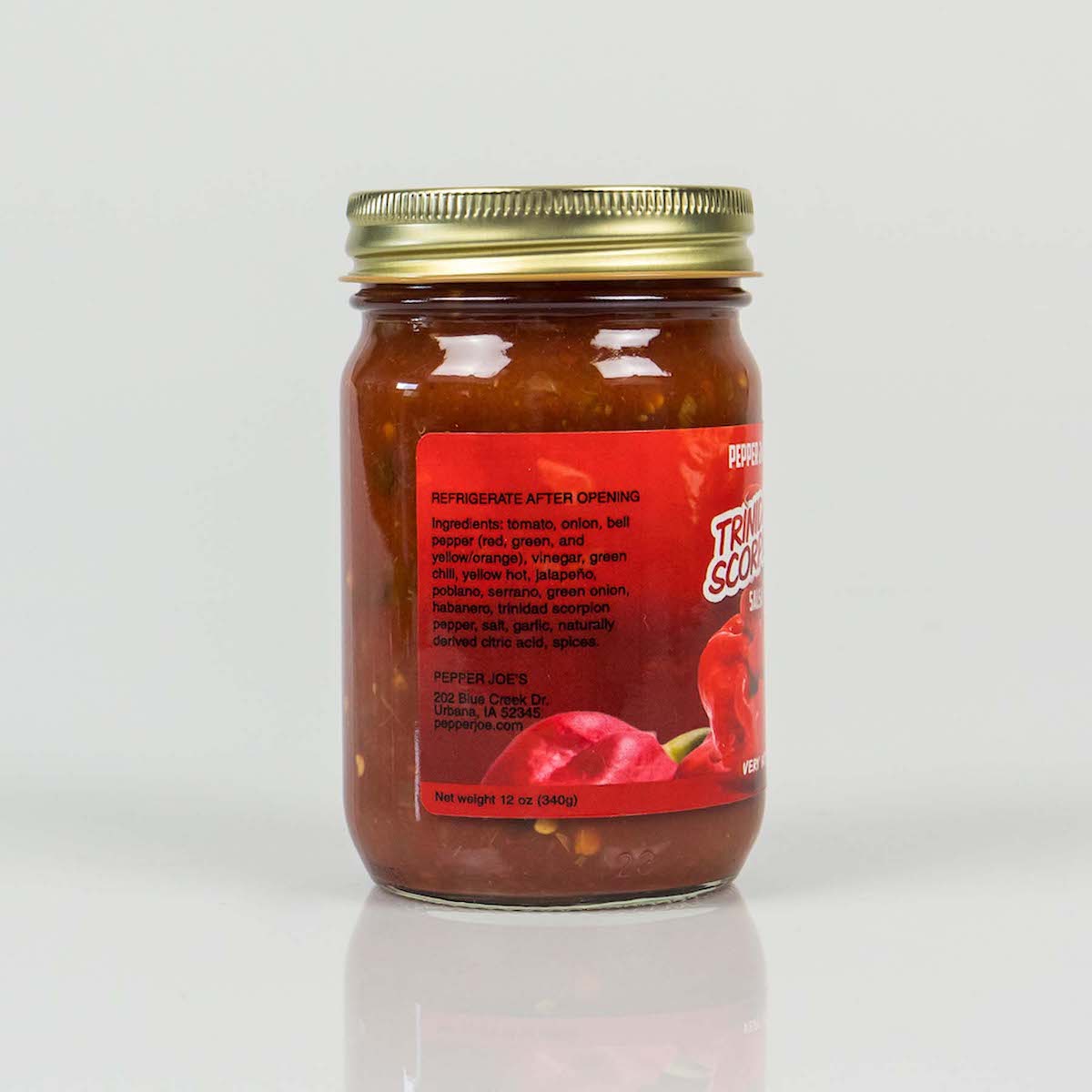 Pepper Joe's Trinidad Scorpion spicy salsa on white background