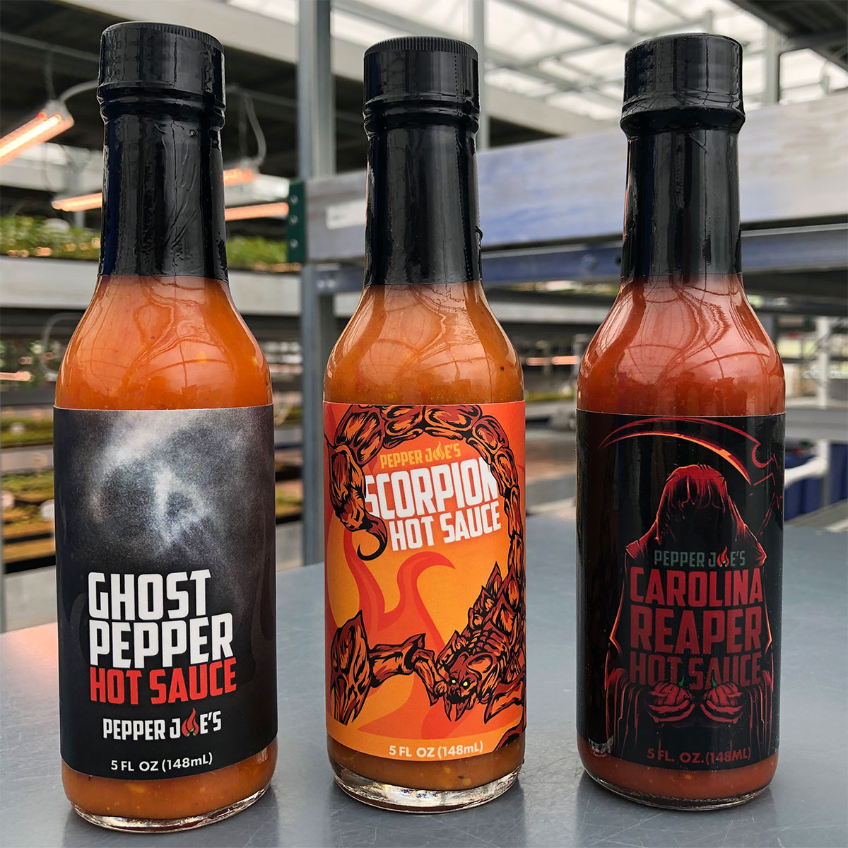 Pepper Joe's Carolina Reaper hot sauce, Ghost pepper hot sauce, Trinidad Scorpion hot sauce