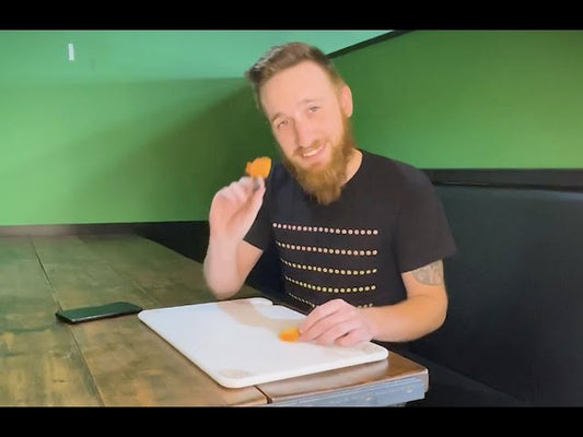Nate Eats a Peach Carolina Reaper (1.5M+ SHUs)