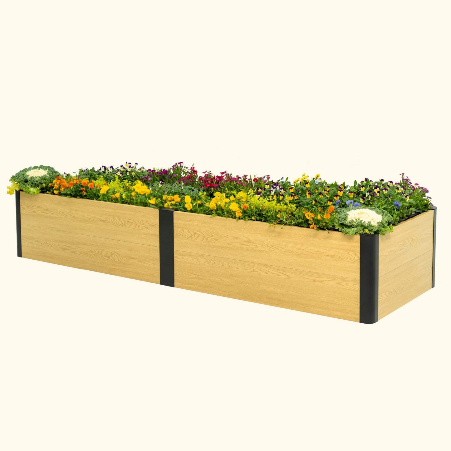 16 inch tall woodgrain 2 foot by 8 foot metal raised garden bed with flowers on a white background