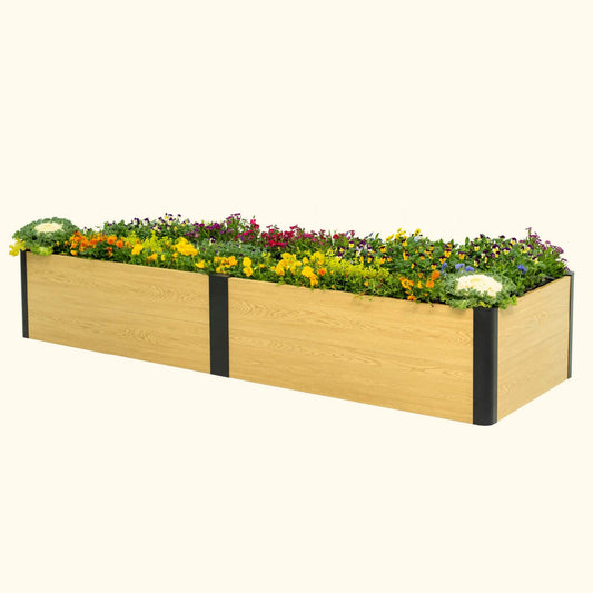 16 inch tall woodgrain 2 foot by 8 foot metal raised garden bed with flowers on a white background
