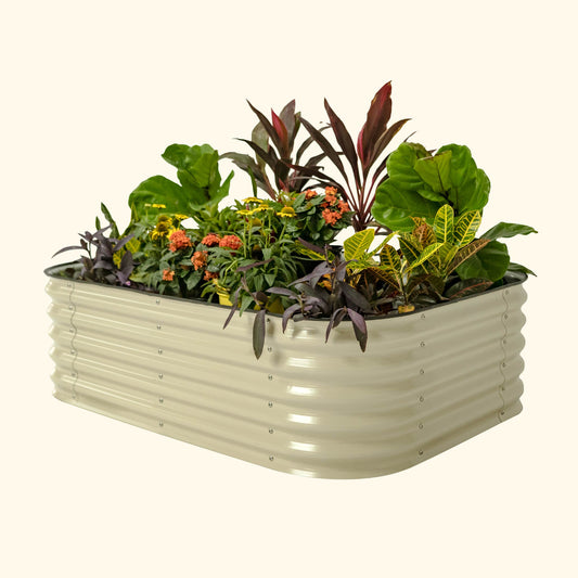 A pearl white 6 in 1 small modular metal raised garden bed with colorful flowers and plants on a white background.