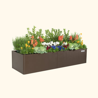 Umber Brown 17 inch tall modern raised garden bed with colorful flowers and plants on a white background.