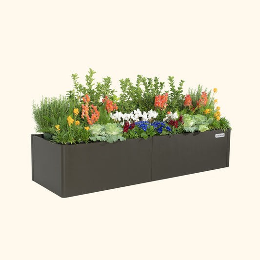 Urban Charcoal 17 inch tall modern raised garden bed with colorful flowers and plants on a white background.