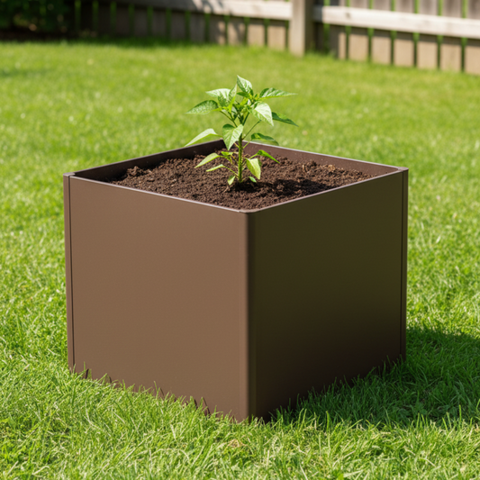 Image of extra tall umber brown 42 inches by 42 inches square raised garden bed with a young pepper plant planted in it.