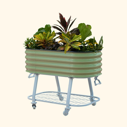 Olive Green elevated metal garden bed with wheels and self watering system with plants on a white background