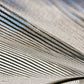  close up of underside of white shade cloths material
