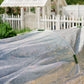 white shade cloth being used over crop row outdoors