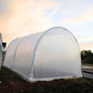 Backview of Hobby Greenhouse in a Backyard Setting.