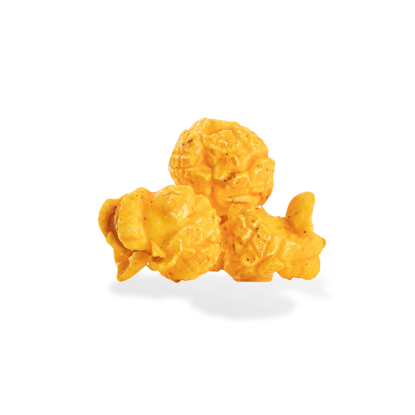 Three pieces of Cajun popcorn on a white background