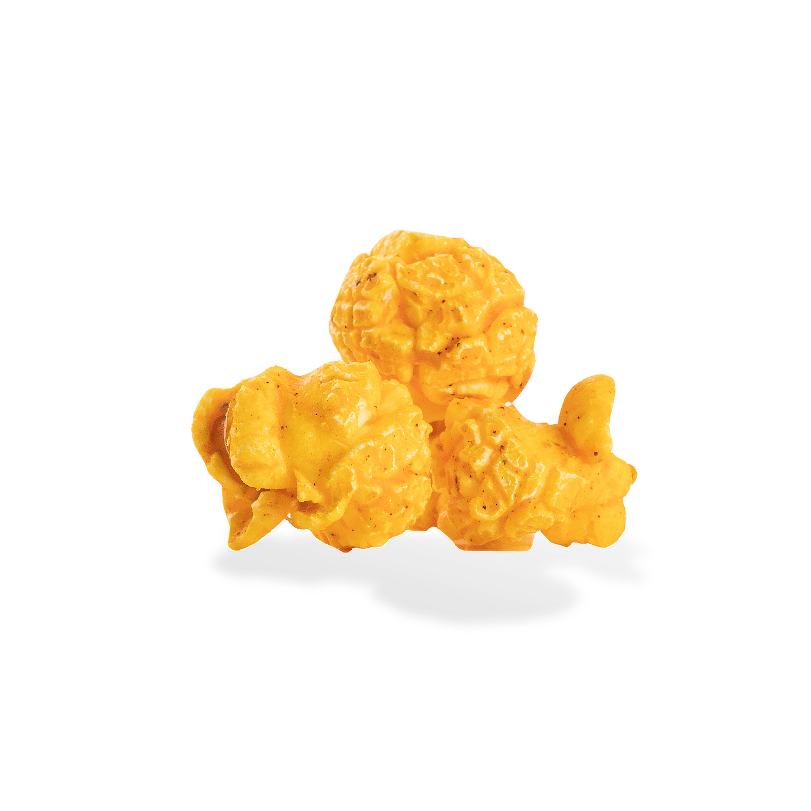 Three pieces of Cajun popcorn on a white background