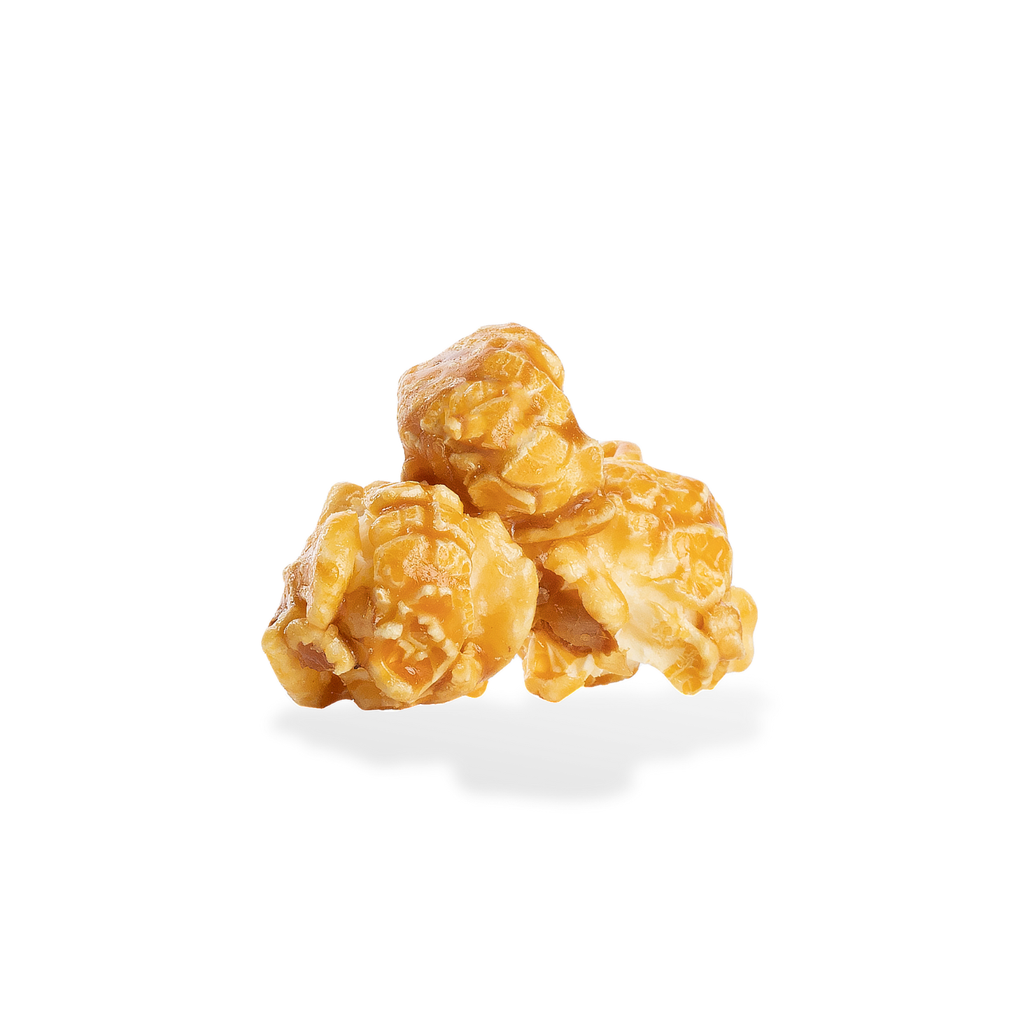 Three pieces of Caramel popcorn on a white background