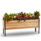 Cedar Planters 18x72 inch raised garden bed 30 inches tall filled with colorful plants on white background 