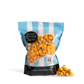 Bag of City Pop Cheese and Caramel Mix popcorn with visible branding on a white background