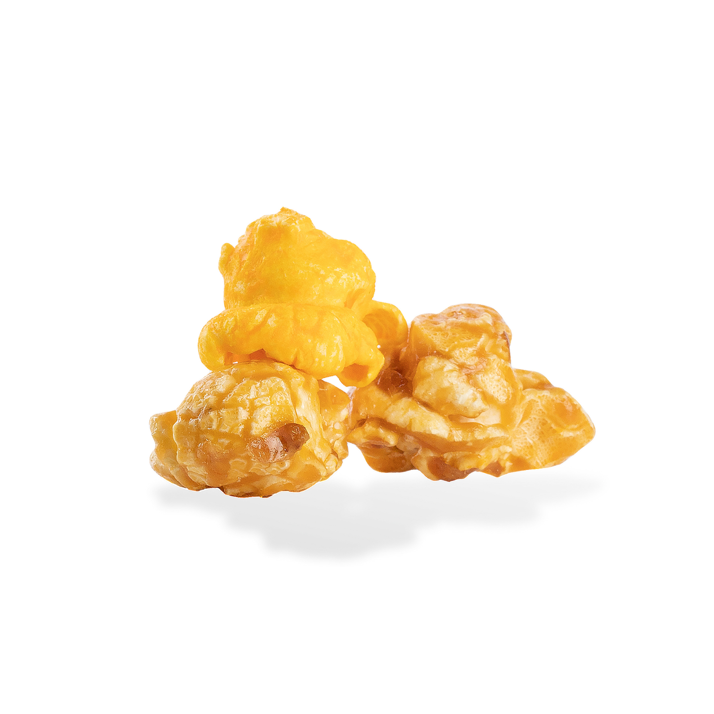 Three pieces of Cheese and Caramel Mix popcorn on a white background