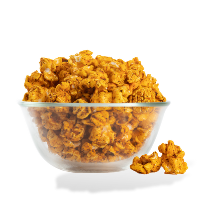 Chili Lime Popcorn popped in a bowl on a white background