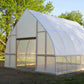 DIY Gothic Hoop House front door angled side view with transparent panels in an outdoor setting