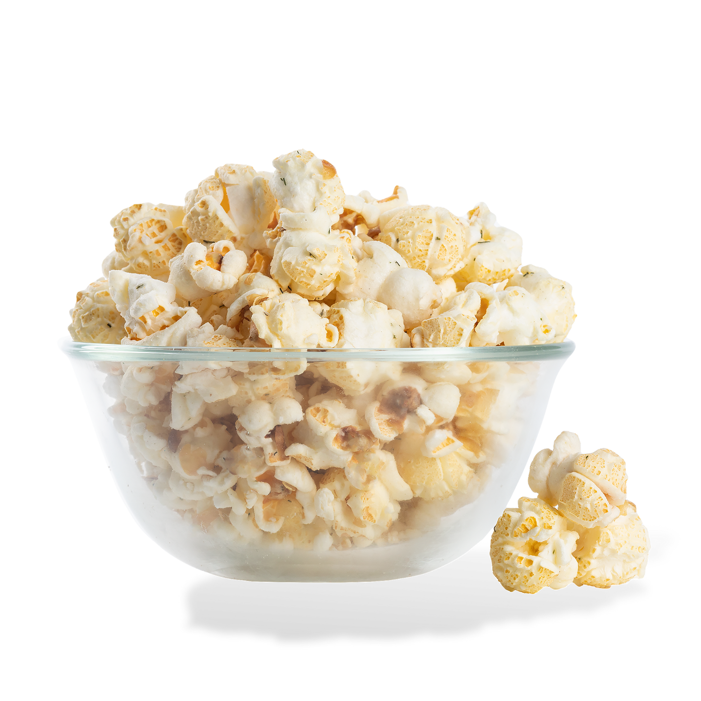 Dill Pickle Popcorn popped in a bowl on a white background