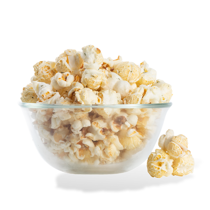 Dill Pickle Popcorn popped in a bowl on a white background