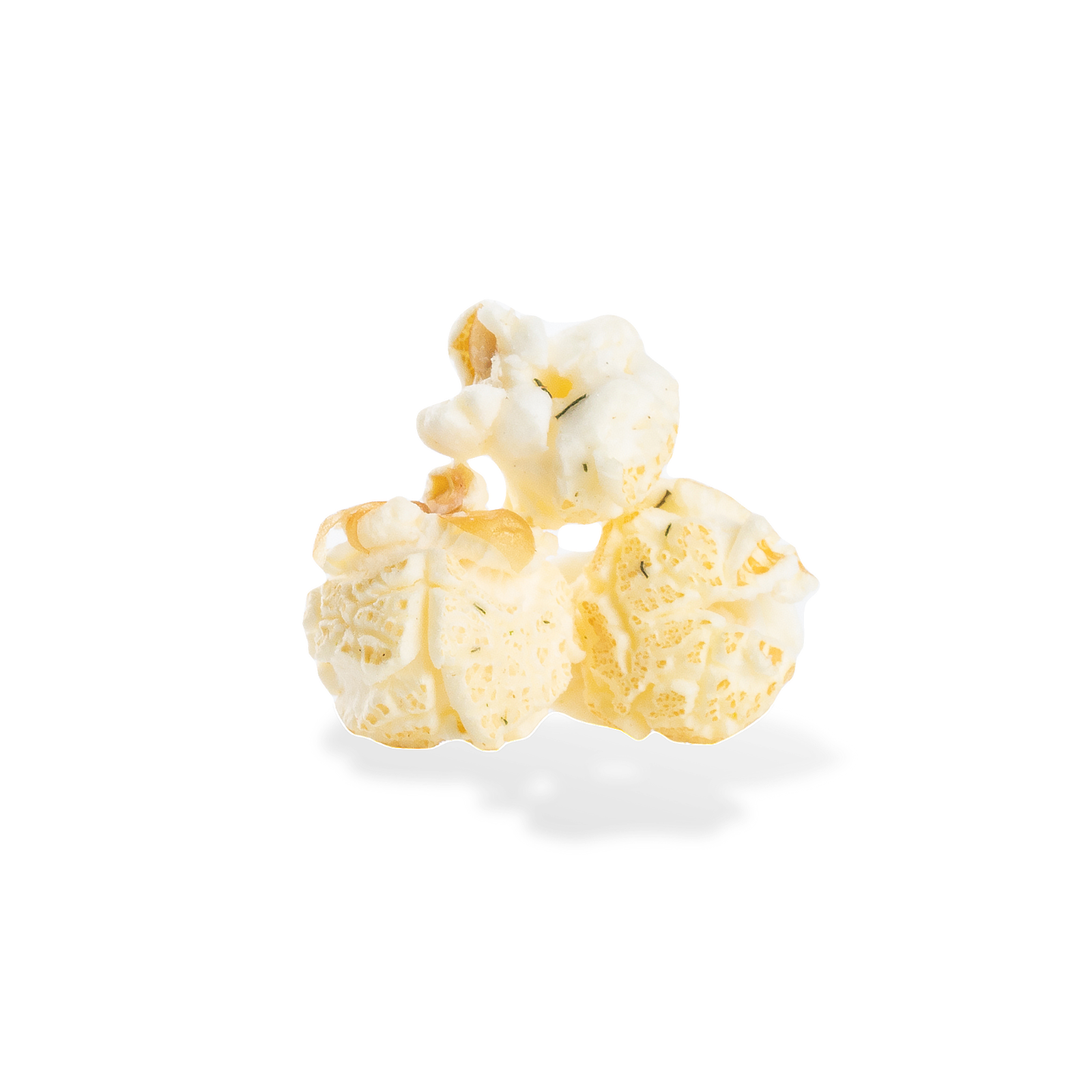 Three pieces of Dill Pickle popcorn on a white background