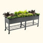 Modern Gray elevated metal garden bed with wheels and plants on a white background