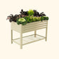 A pearl white elevated garden bed with color plants inside on a white background.