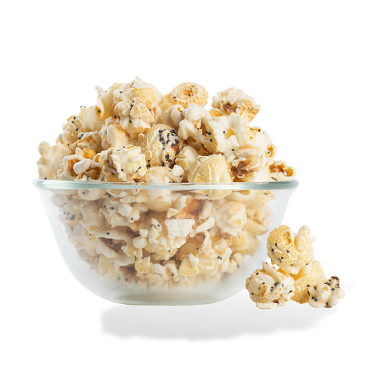 Everything Bagel Popcorn popped in a bowl on a white background