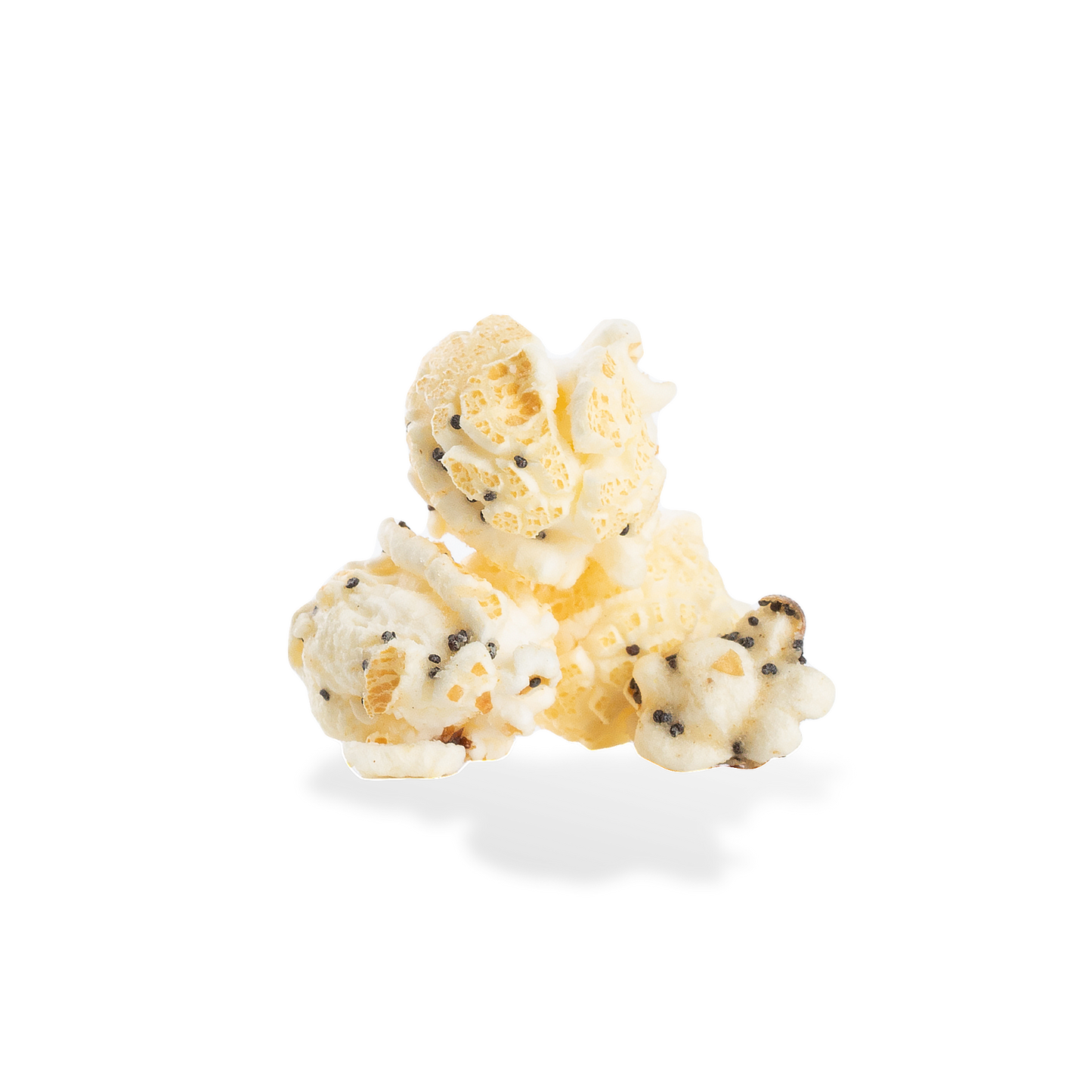 Three pieces of Everything Bagel popcorn on a white background