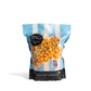 Bag of City Pop Extra Buttery Caramel Cheese Mix popcorn with blue and white striped design on a white background