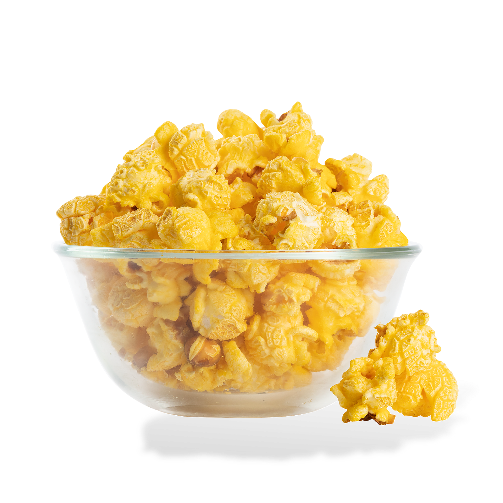 Extra Buttery Popcorn popped in a bowl on a white background