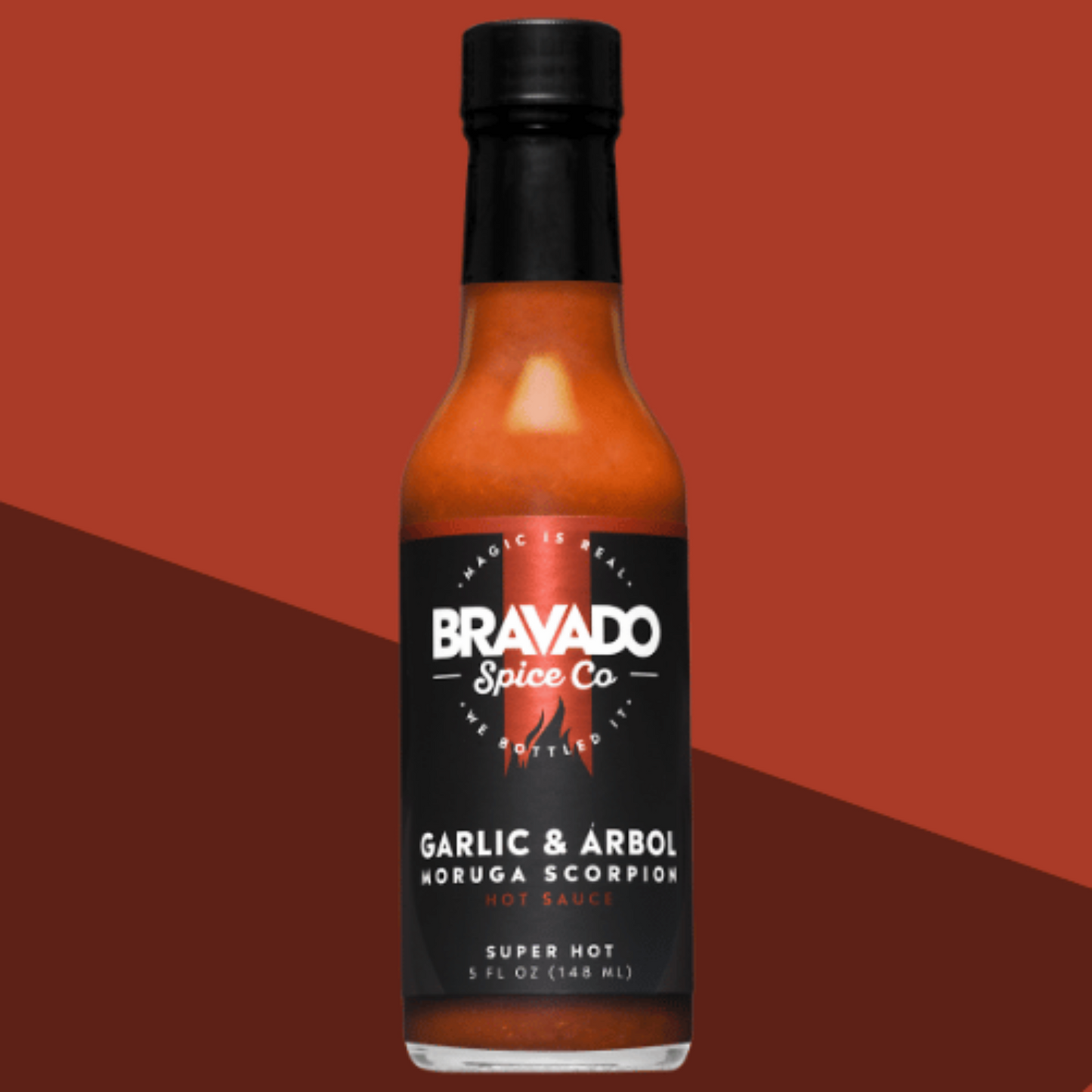 Bottle of Garlic & Arbol Moruga Scorpion hot sauce on a brown background