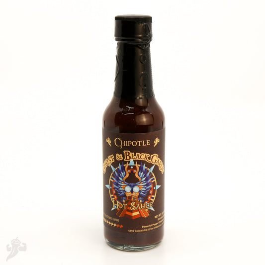 A bottle of Chipotle Ghost and Black Garlic Hot Sauce displayed on a white background