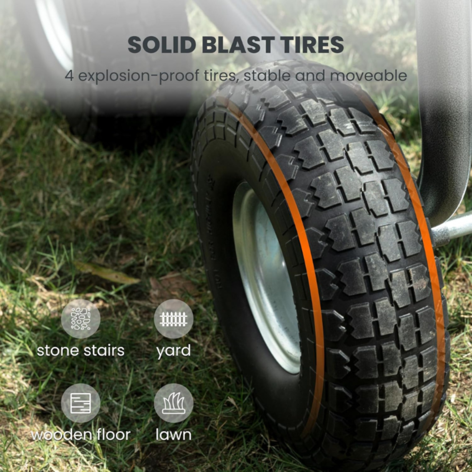 Zoomed in on solid blast tire on the Heavy Duty Garden Hose Reel cart sitting in grass.
