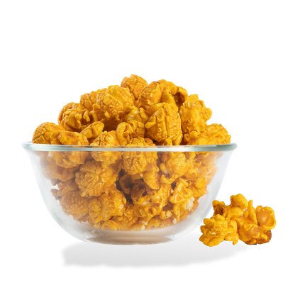 Jalapeno Cheddar Popcorn popped in a bowl on a white background