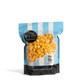 Bag of City Pop Loaded Potato popcorn with blue and white striped design on a white background