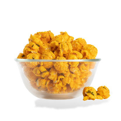 Loaded Potato Popcorn popped in a bowl on a white background