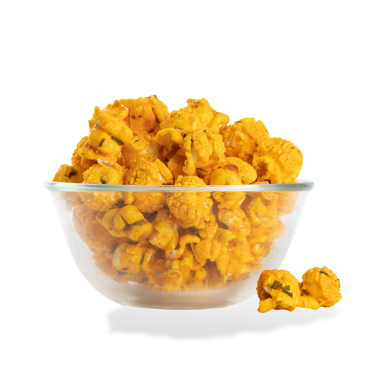 Loaded Potato Popcorn popped in a bowl on a white background