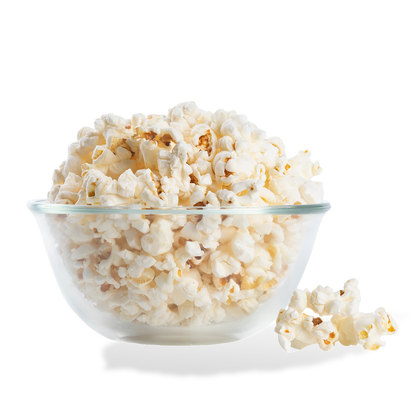 Low Salt Popcorn popped in a bowl on a white background