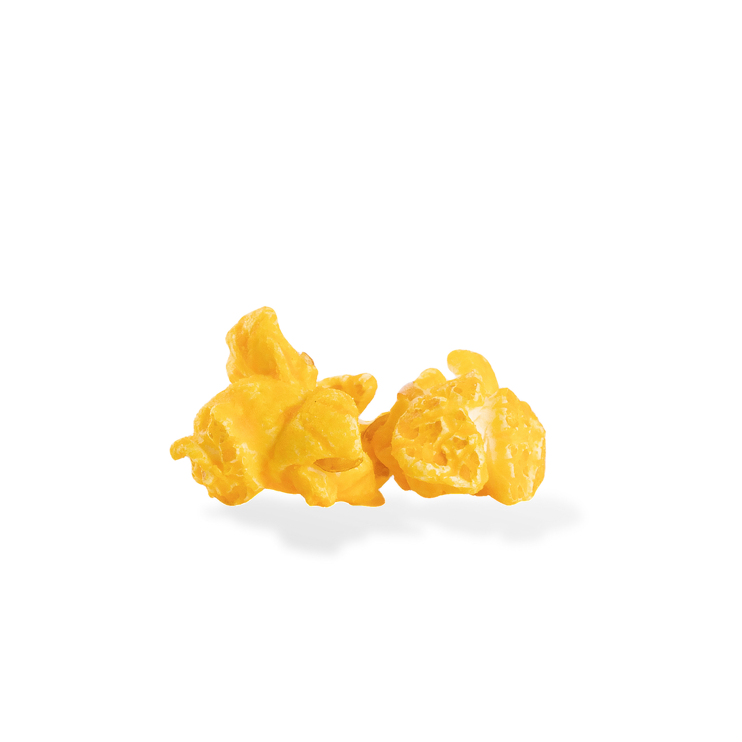 Three pieces of Mac and Cheese popcorn on a white background